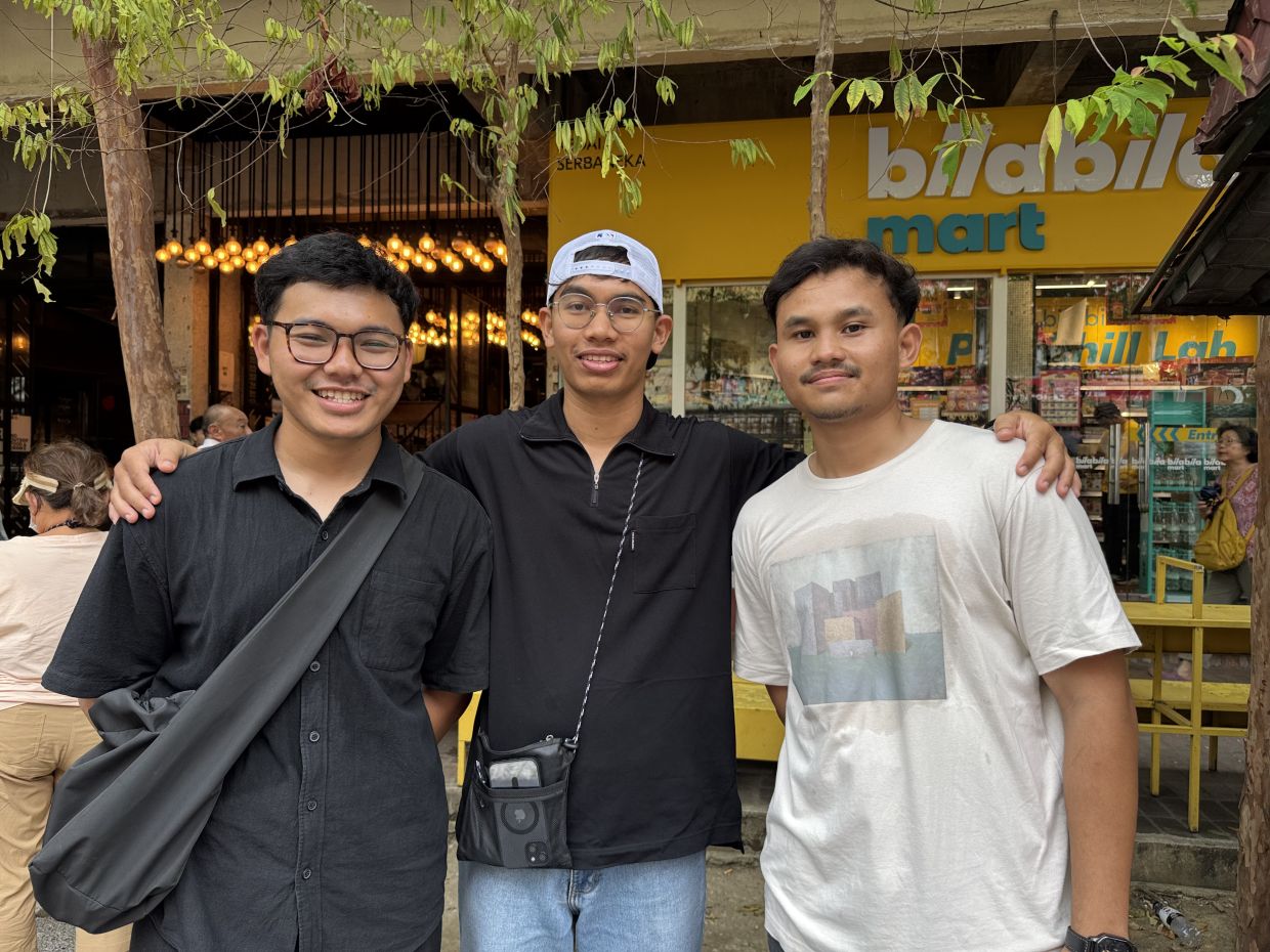 Muhammad Aizat with friends.
