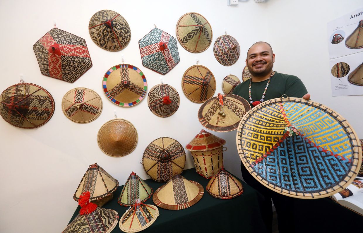Joy, a Sabah cultural advocate and artist, founded Bundusan Books in 2022 and has since expanded his practice to beadmaking, documentary work and research into Sabah’s arts and crafts, including sirung hats. Photo: The Star/Azlina Abdullah