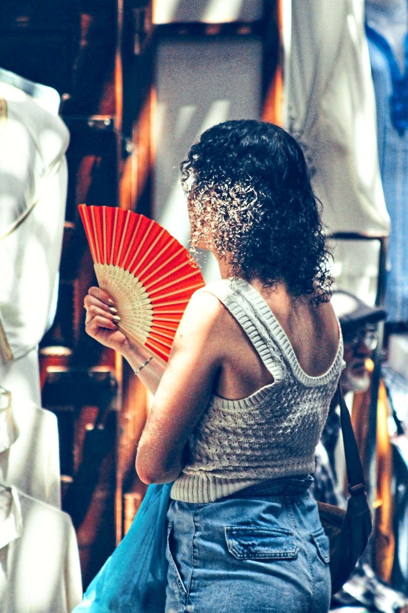 With the prolonged heatwave hitting many European countries, including Spain, this summer, people have taken to using the abanico to cool down.