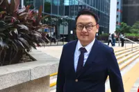 Hong Kong district councillor remanded in custody after underage sex conviction