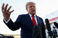 Trump lashes out at Fed after Warsh backs rate hike