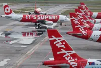 AirAsia plunges to four-year low on route absorption report
