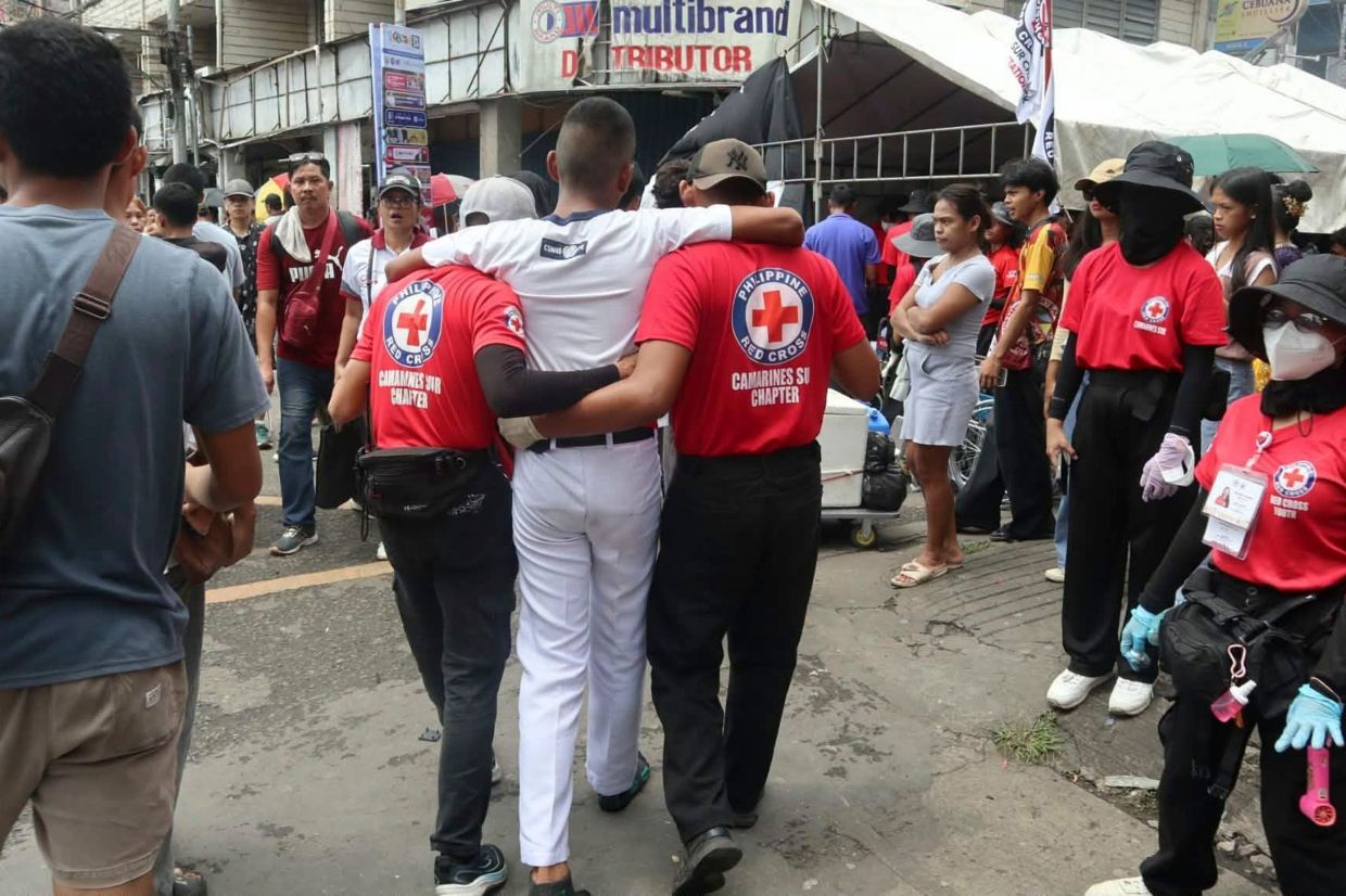 In this handout photo provided by the Philippine Red Cross, Red Cross members assist in an exercise in Camarines Sur province, Philippines, on Friday, Sept. 18, 2026. -- Photo: Philippine Red Cross via AP
