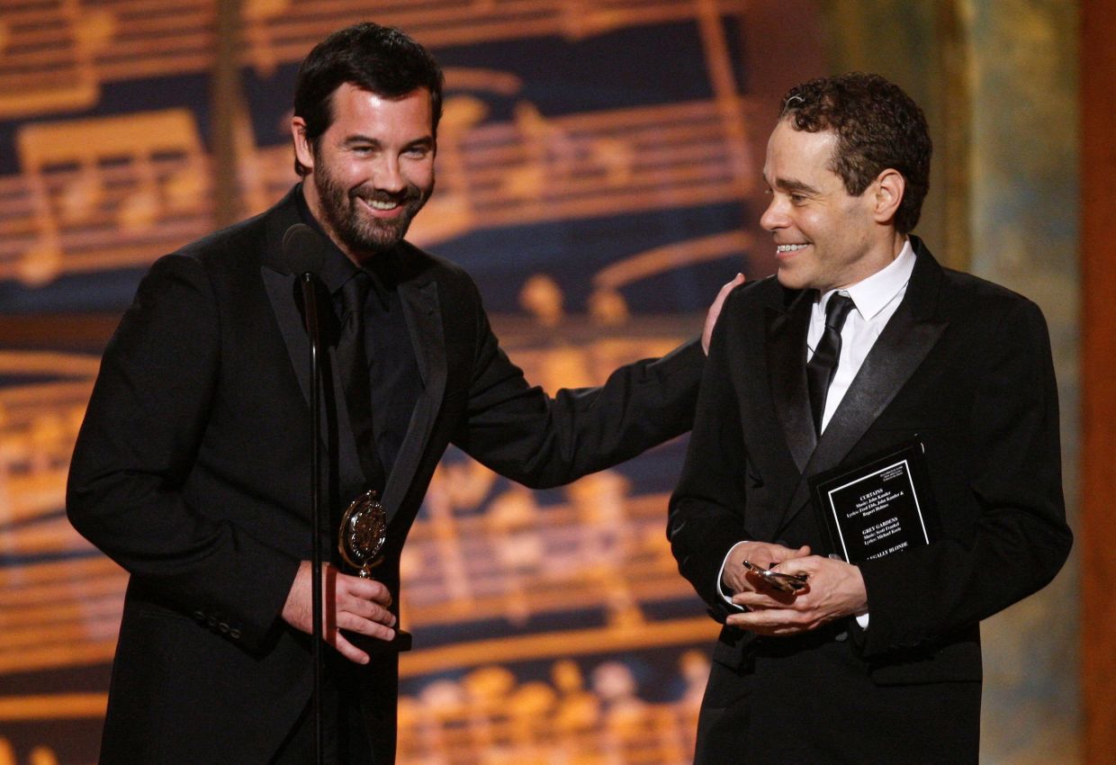 Duncan Sheik (left) pats Steven Slater on shoulder after they won the award for Best Original Score Written for the Theatre at the 61st Annual Tony Awards in New York City, US June 10, 2007. Photo: Reuters