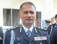 Cops seize firearms and drugs from foreigner in Tawau house raid