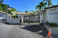 Media gather outside Najib's residence amid house arrest rumours