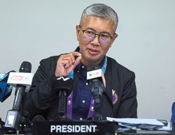 BAM boss Zafrul respects Misbun's views but calls for faith in Asiad shuttlers