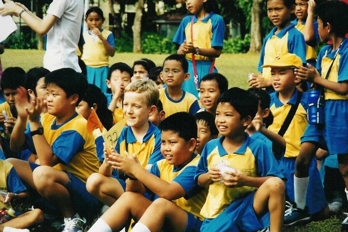 Tyler Creasman when he was a Qiaonan Primary 3 pupil in the early 2000s. - TYLER CREASMAN via ST/ANN