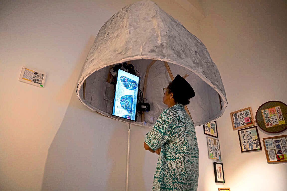 A visitor enters the sound dome of 'Toko Keperluan Perang' by Indonesian artist and filmmaker Anggun Priambodo at GMBB. Photo: Filamen