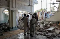 Death toll at 31 in Pakistan police compound attack, AFP reports