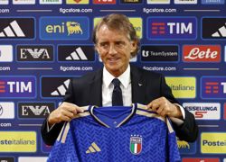 Soccer-Mancini names nine uncapped players in expanded Italy squad after summer turmoil