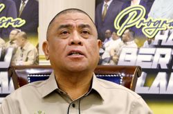 Tone down rhetoric if you want a pact, Perak MB tells PAS