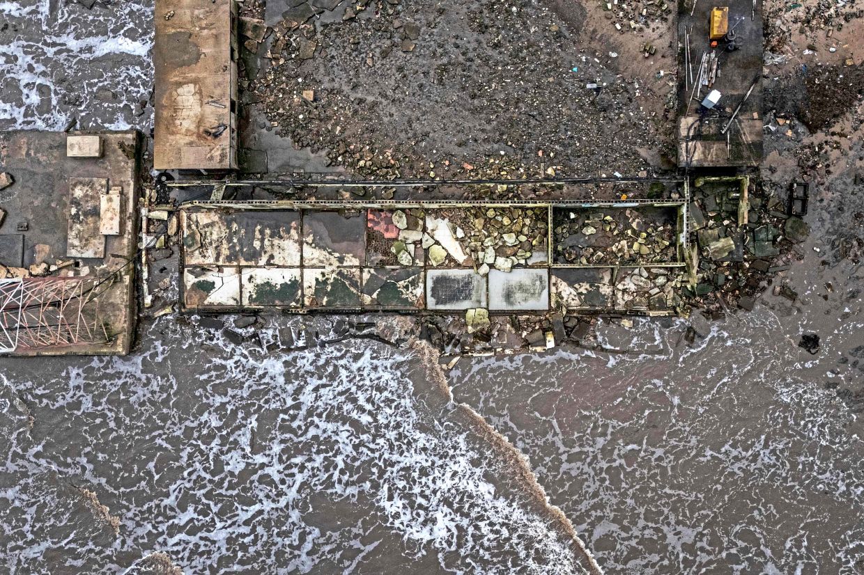 Since the early 2000s, coastal erosion in Ayetoro has progressively intensified, with the Atlantic Ocean gradually encroaching on the settlement, swallowing homes, schools, and other infrastructure.