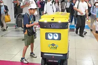 A clean sweep? Tokyo puts robot bins to the test