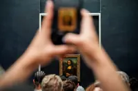 Stick no paintings: Germans arrested for Louvre stunt in Mona Lisa hall