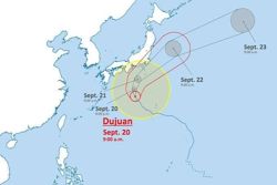 Heavy rain disrupts trains in Japan as cyclone Dujuan approaches