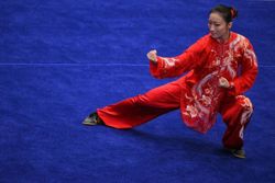Wushu exponent Zeanne Law wins Singapore’s first medal at the Asian Games; Brunei's Basma makes history