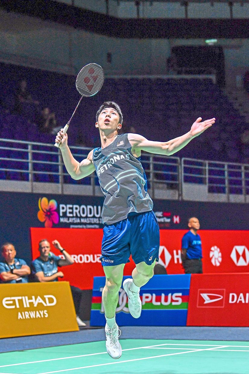 Malaysia men’s singles shuttler Eogene Ewe in action against Denmark's Ditlev Holm in the qualifying rounds of Malaysian Masters at Unifi Arena, Bukit Jalil on May 19, 2026. — IZZRAFIQ ALIAS/The Star