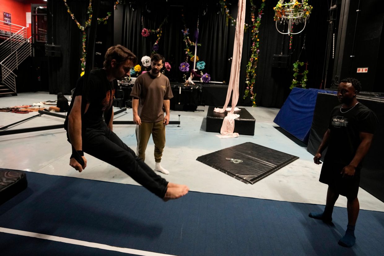 Performer Ryan McGeer rehearses at The Cirk.