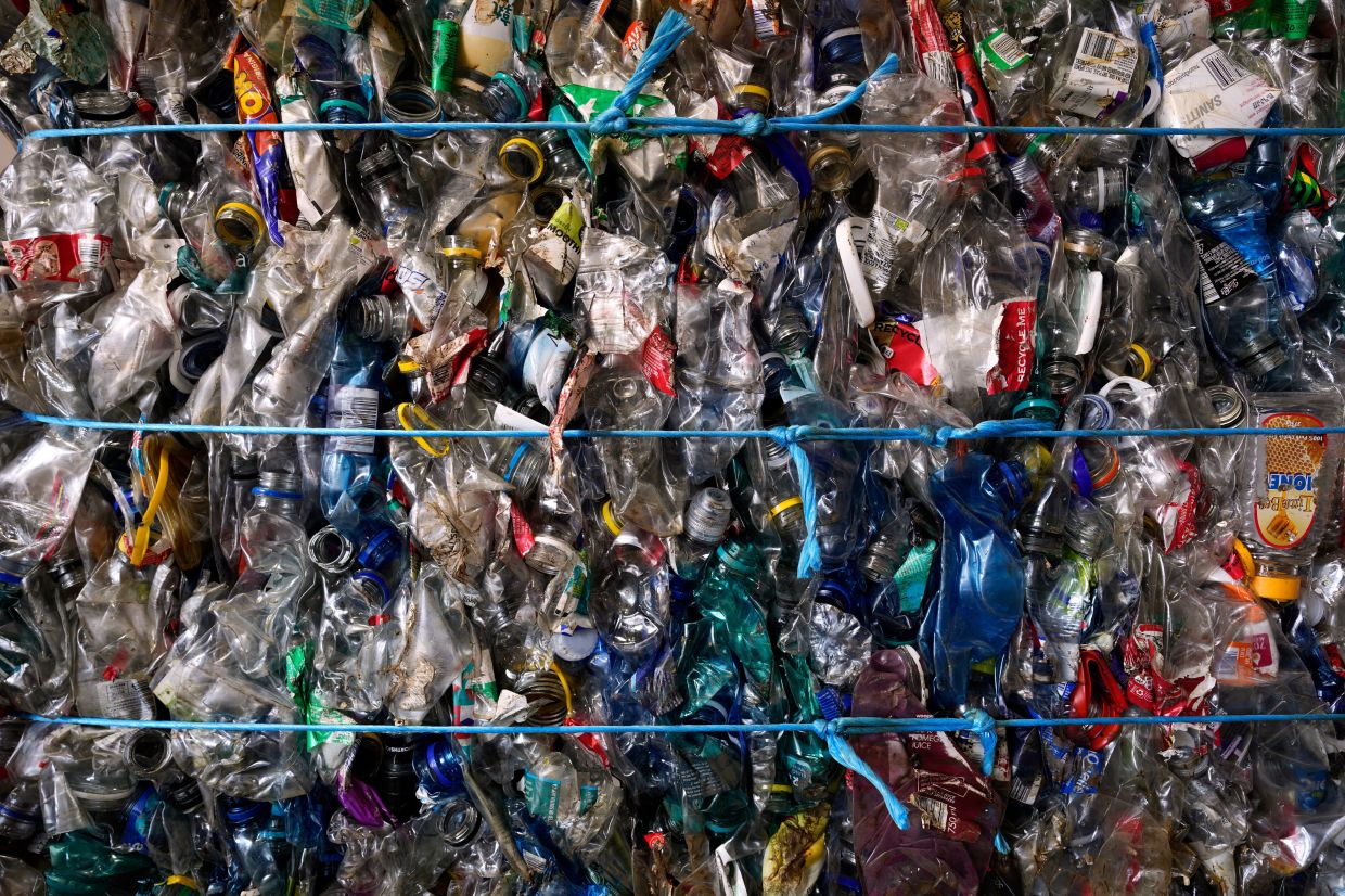 Bales of compressed plastic bottles ready for recycling are displayed at the Whole Earth Recycling in Johannesburg.