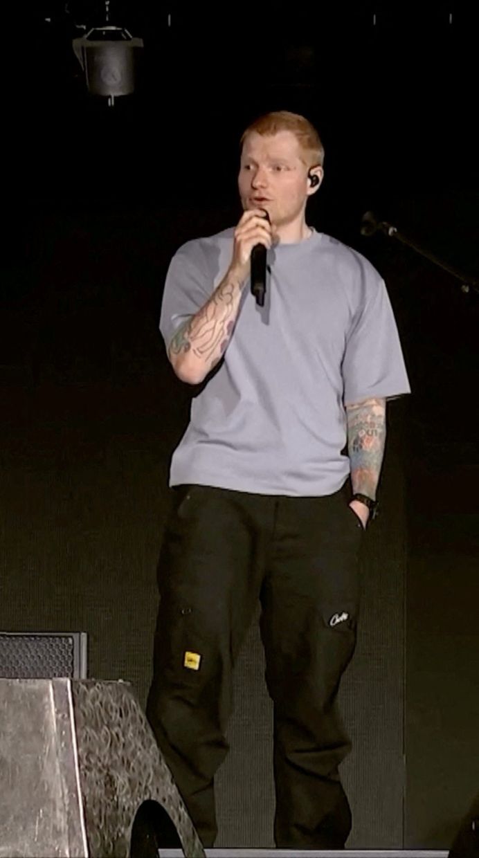 Singer Ed Sheeran speaks on stage as he addresses a controversy over Macklemore being pulled from the tour after saying 'Free Palestine' at a show early this month, in Philadelphia, Pennsylvania, US Sept 19. Photo: Screengrab