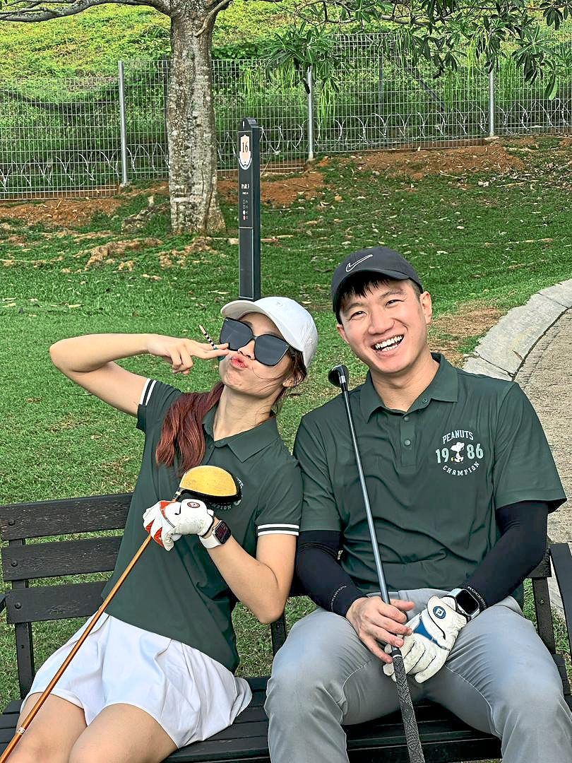 Choo (left, with her partner) thinks Chiang Mai would be perfect as her first overseas golfing destination. — CHOO LEANNE