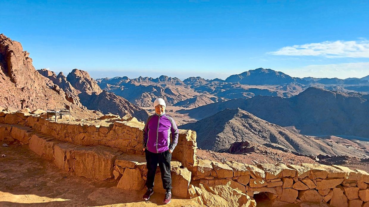 One of the writer’s tour mates posing with a view of Mount Sinai’s surroundings behind her. – Photos: ANGIE LIM