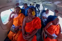 Sri Lanka flies monks over drought-hit areas to seek divine help