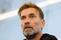 Soccer-Germany coach Klopp earns praise for split squad idea