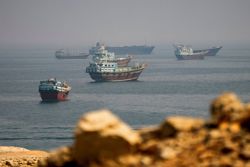 Vessels trickle through Strait of Hormuz as Middle East conflict persists