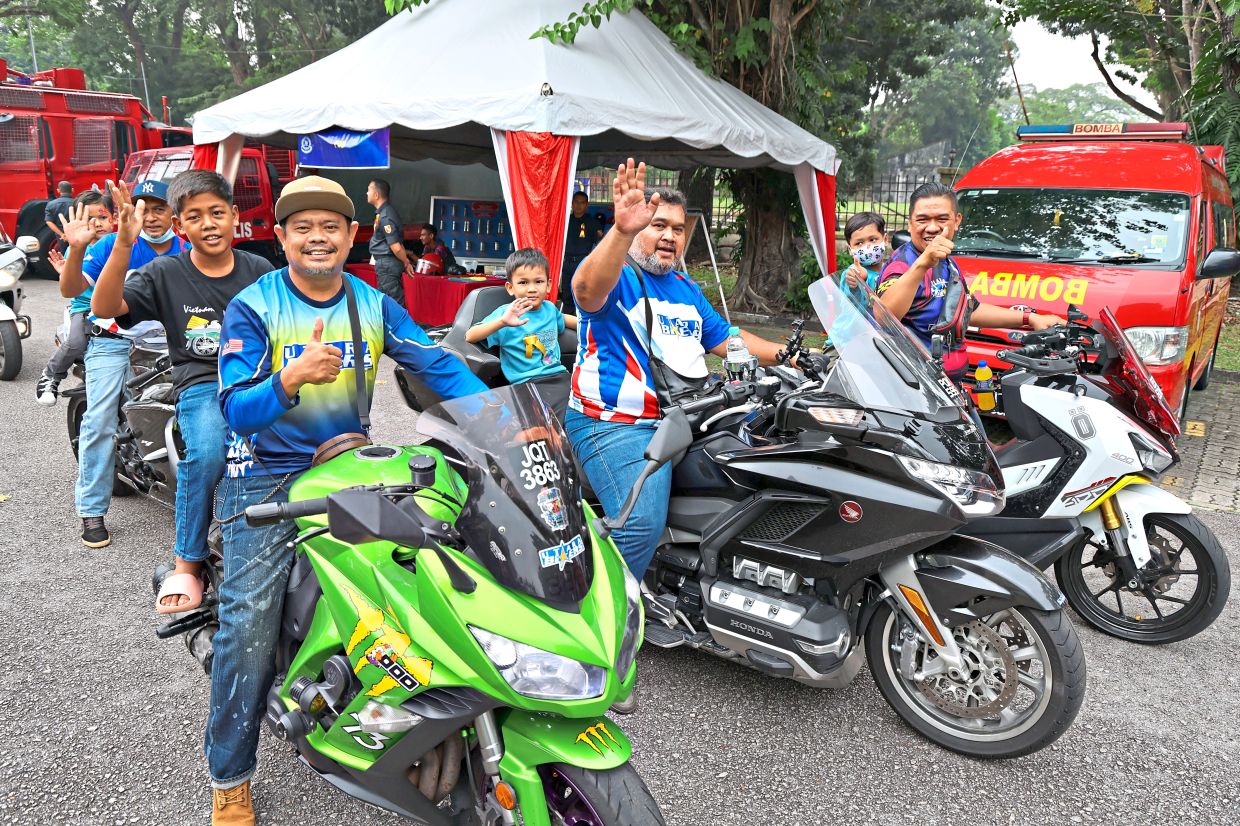 Utara Bikers giving some of the children a memorable ride on their machines.