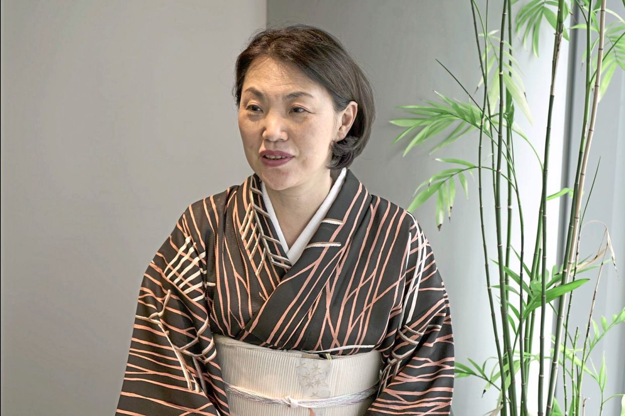 Ikenobo headmaster designate Senko Ikenobo speaks during an interview in Tokyo. — Photo: AP/Mayuko Ono