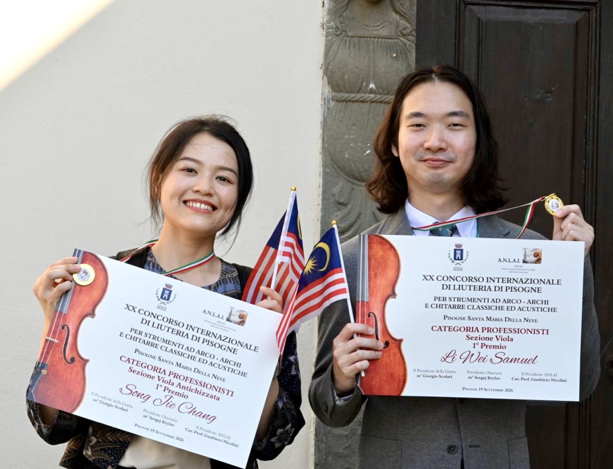 This achievement is a big step forward from Chang (left) and Samuel Wong after winning gold and silver medals in the non-professional category in 2023. Photo: TAN CHIN SENG