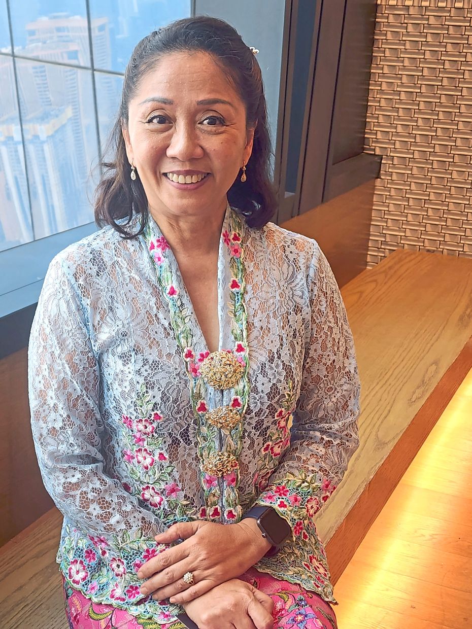 De Souza learnt how to cook from her mother and grandmother and remembers being tasked with pounding sambal belacan as a child.