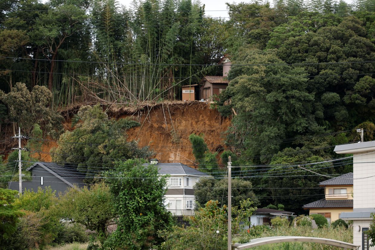 The site of a landslide after Typhoon Dujuan brought torrential rain to Sakura, Chiba prefecture, Japan on Sept 22, 2026. - Reuters