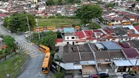 Buses, vans hogging KL residential roadsides