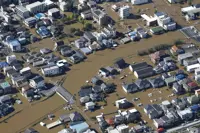 Torrential rains brought by Japan typhoon kill two, NHK says