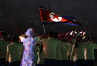 Two North Korea members of Asian Games seek asylum in Japan, report says