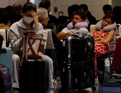 Flights scrapped, evacuations urged as Typhoon Dujuan wallops Japan
