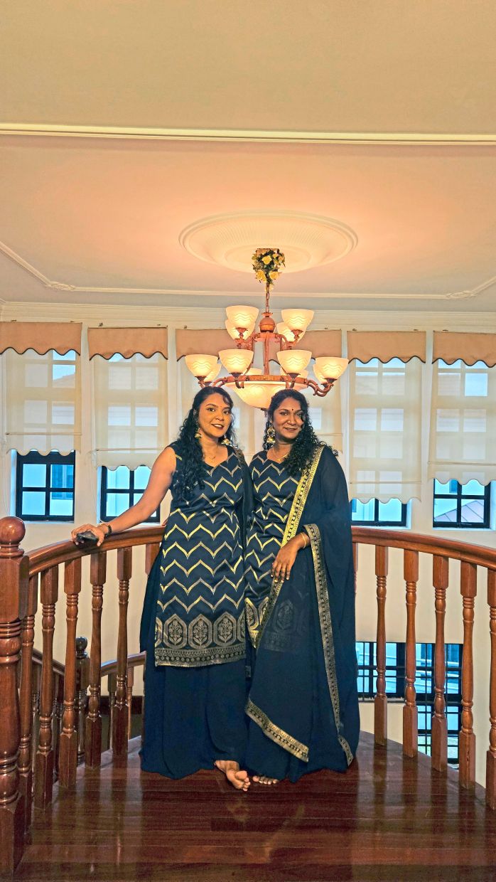 Dharishinni Devi Kumar (left) and Sivaanni Kumar note that different types of wavy and curly hair require different approaches. Photo: Surul Curls