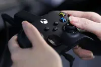 Xbox cuts jobs, moves game studios under Activision