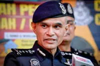 Cops yet to identify man found dead in aircraft wheel well