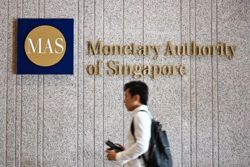 Singapore’s record AI boom unlikely to move MAS: Analysts
