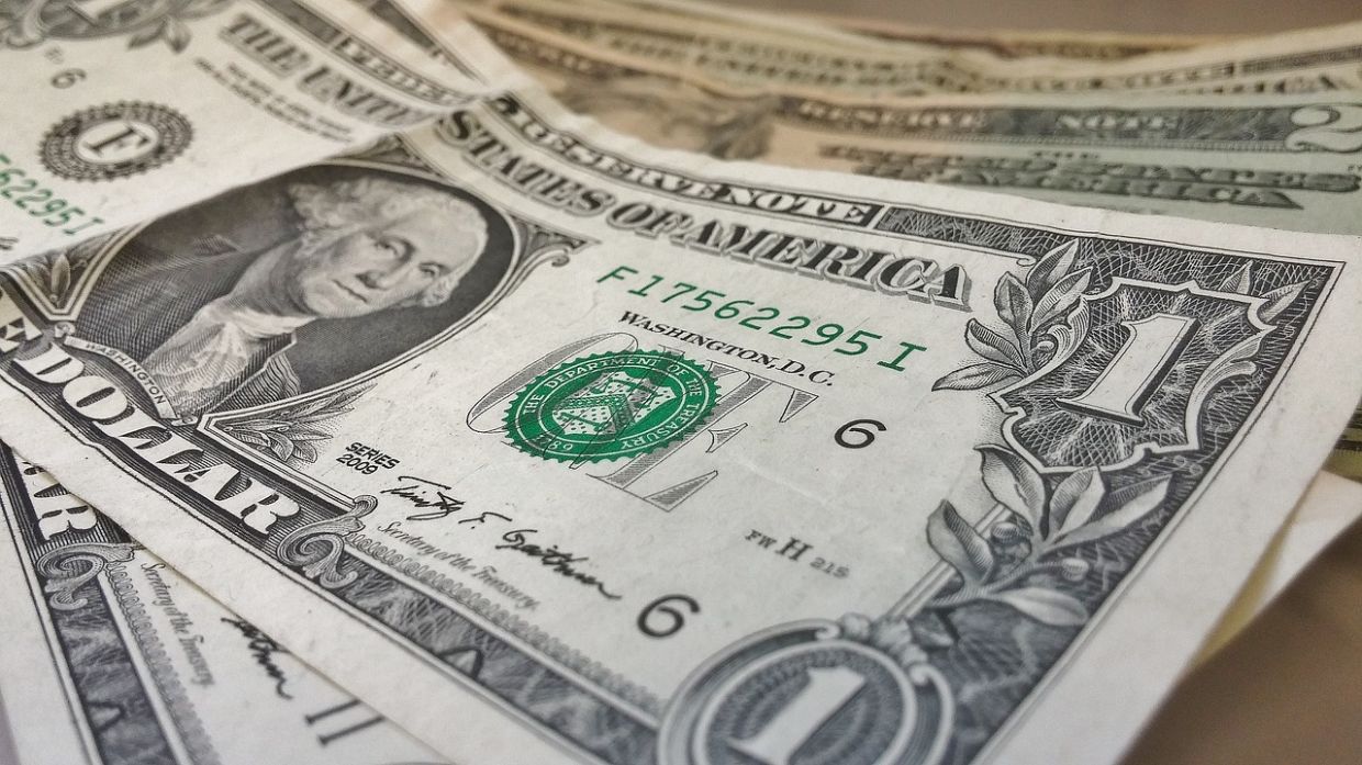 Dollar perched at two-month high as hot PMI fuels inflation fears, rate hike bets