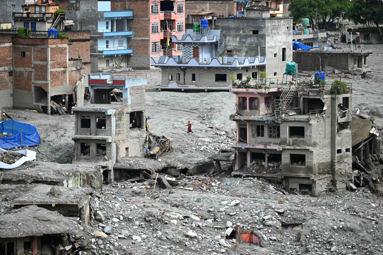 Photo: thestar.com.my Many Nepalis swept away in floods not officially dead, leaving families in limbo