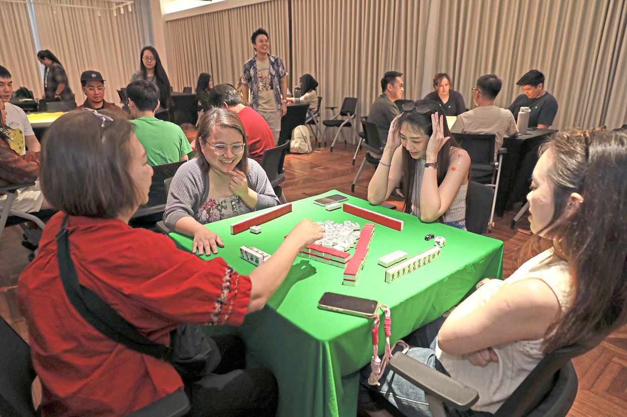 Jom Mahjong runs sessions almost every week and is open to players of all skill levels, even those with zero experience. Photo: The Star/Yap Chee Hong
