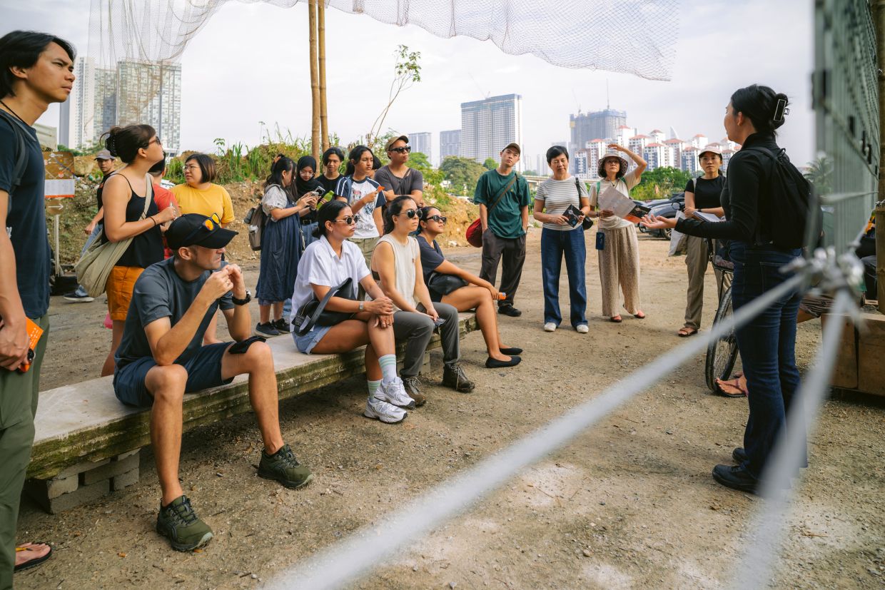 Neighbourhood walks and trails are also part of KRF, with guides on hand to share the stories behind selected stops and highlight some of the environmental challenges facing the area. Photo: Klang River Festival