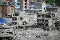 Thousands missing, aid needs mount one month after Nepal's deadly floods