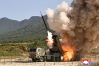 North Korea touts upgraded rocket system, urges stronger firepower along border
