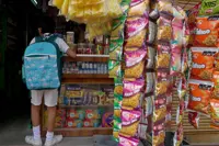 India takes battle against junk food to shops near schools